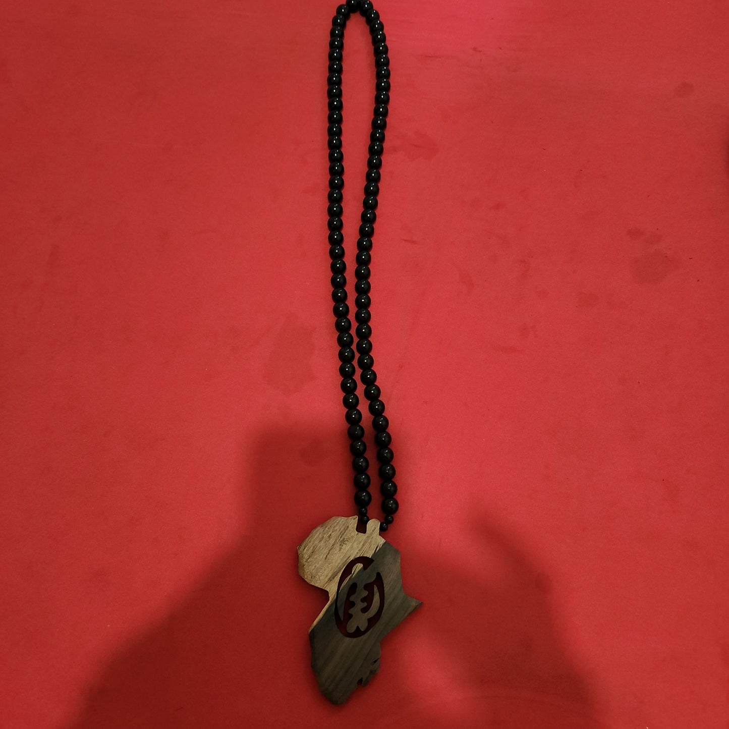 Black Wood Beaded Necklace with Africa Medallion